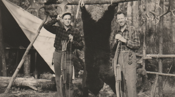 Fred Bear with Jim Henderson and a black bear cape in 1943