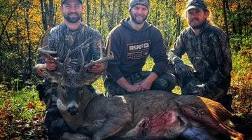 Three amigos with a 130 class whitetail deer